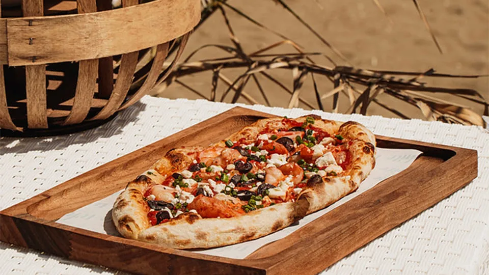 Pizza on a wooden board